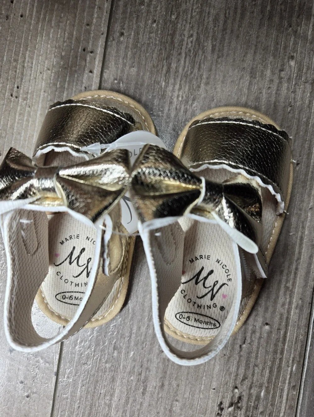 NWT Marie Nicole Metallic Gold Bow Baby Girl Sandals 0–6M